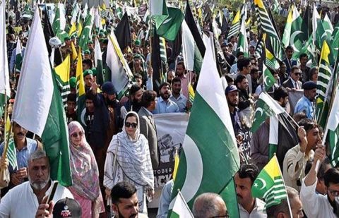Kashmiris observing Accession to Pakistan Day