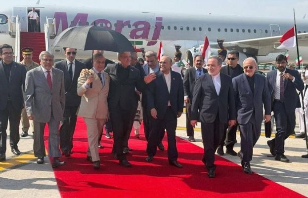 Iranian President Pezeshkian touches down in Islamabad